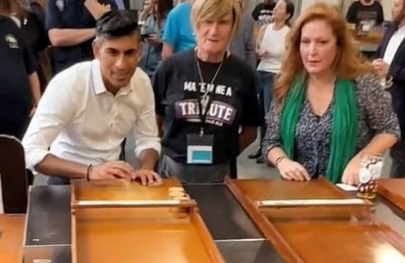 Jane vs Rishi at Shuffleboard